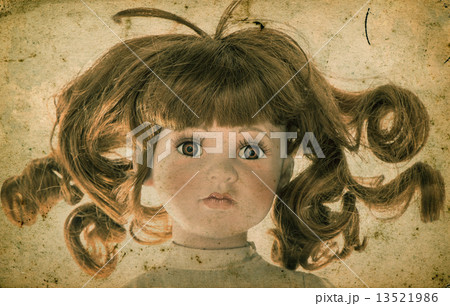Antique doll. Vintage toy. Retro toned picture Antique doll. Vintage toy. Retro toned picture 13521986