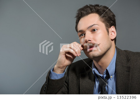 Side view of young author deep in thoughts Side view of young author deep in thoughts 13522396