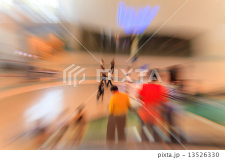 People in escalators at the modern shopping mall 13526330