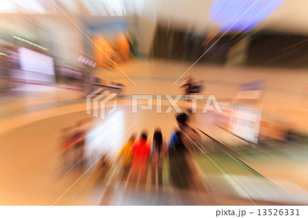 People in escalators at the modern shopping mall People in escalators at the modern shopping mall 13526331