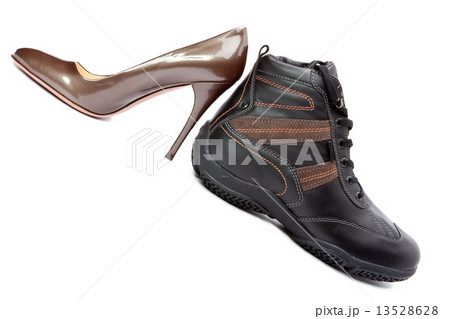 Men's boots and elegant female shoes on white background 13528628