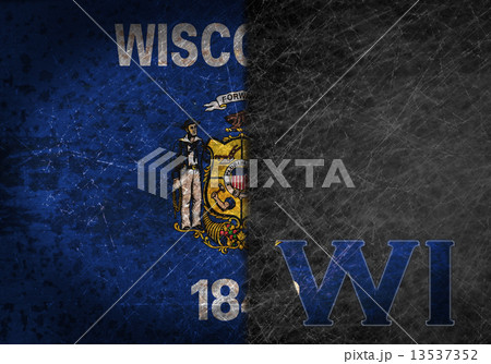 Old rusty metal sign with a flag and US state abbreviation 13537352