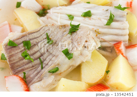 boiled fish with potato and parsley 13542451
