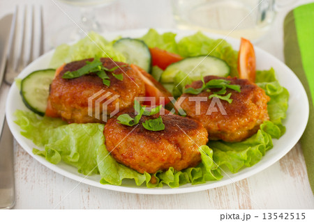 meatballs with sauce and salad on the plate meatballs with sauce and salad on the plate 13542515