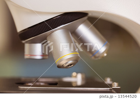Close up on microscope in laboratory Close up on microscope in laboratory 13544520