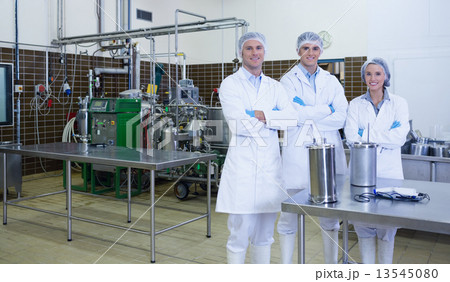 Biologist team with arms crossed smiling at camera 13545080