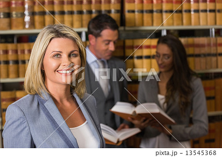 Lawyers in the law library 13545368