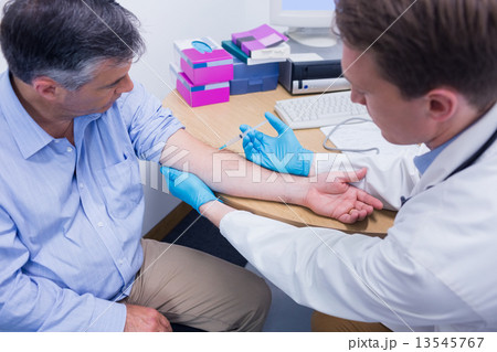 Close up of a patient receiving injection 13545767