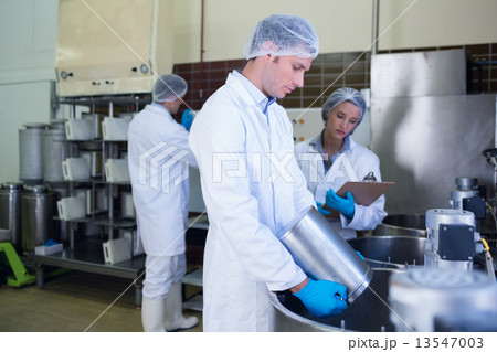 Chemist team working together while girl writing 13547003