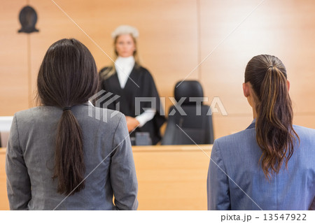 Lawyers listening to the judge 13547922