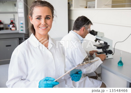 Team of scientists at work 13548466