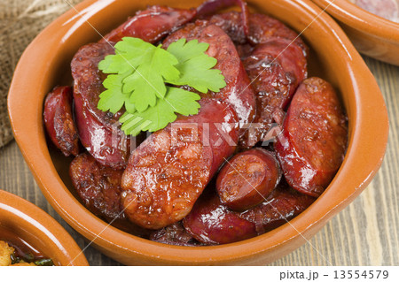 Chorizo al Vino (Spicy sausage cooked in red wine). Tapas.  13554579