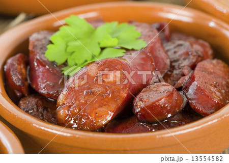 Chorizo al Vino (Spicy sausage cooked in red wine). Tapas.  13554582