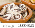 Chicken rolls with black olives and capers. Spanish tapas.  13554583