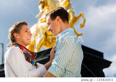 Couple in Dresden with Goldener Reiter statue Couple in Dresden with Goldener Reiter statue 13563053