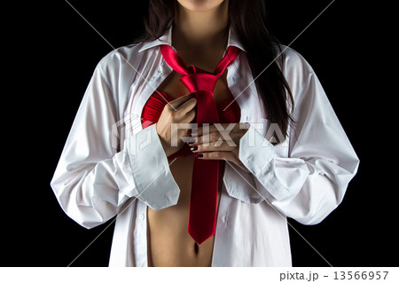 Photo of young woman with red tie 13566957