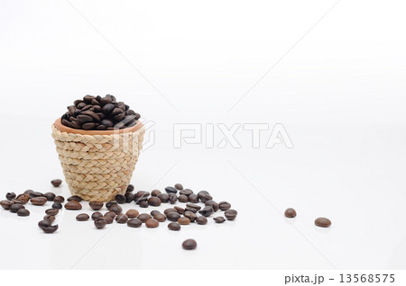 Mini clay pot with rattan rope and coffee seeds. Mini clay pot with rattan rope and coffee seeds. 13568575