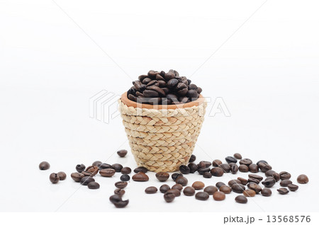 Mini clay pot with rattan rope and coffee seeds. Mini clay pot with rattan rope and coffee seeds. 13568576