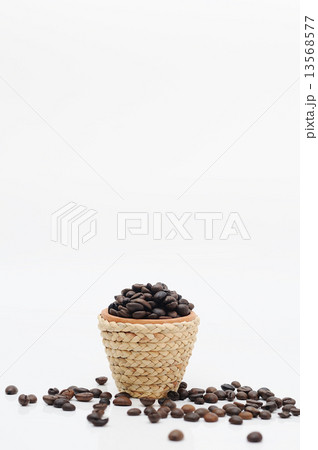 Mini clay pot with rattan rope and coffee seeds. Mini clay pot with rattan rope and coffee seeds. 13568577