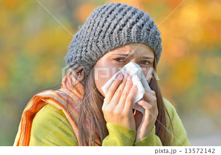 girl blowing nose girl blowing nose 13572142