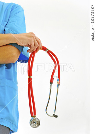 Close-up image of stethoscope and medical uniform Close-up image of stethoscope and medical uniform 13573237
