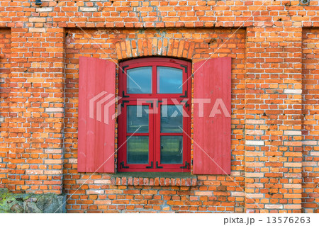 fragment of a brick wall with a window 13576263