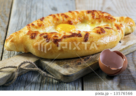 Georgian cheese pie and egg yolk. 13576566