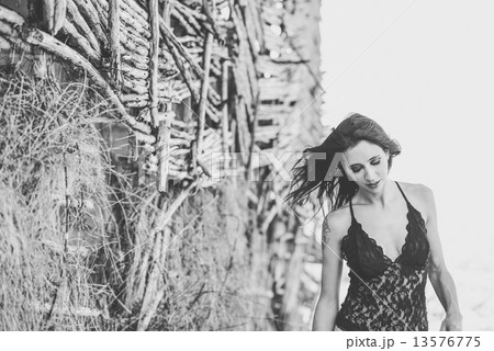 Woman in underwear in a forest 13576775