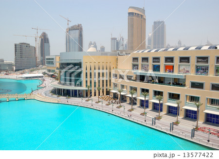 The Dubai Mall. It is the worlds largest shopping mall located in Burj Khalifa complex and has 1200 The Dubai Mall. It is the worlds largest shopping mall located in Burj Khalifa complex and has 1200 13577422