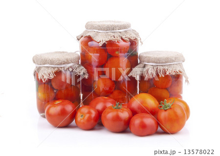 Fresh and canned tomatoes. 13578022