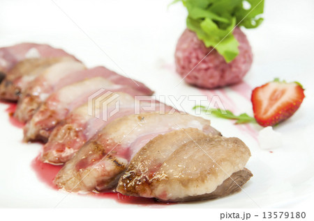 baked chicken breast with rice garnish 13579180