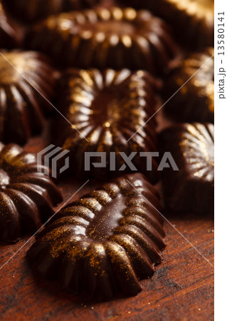 chocolate sweets with edible golden powder chocolate sweets with edible golden powder 13580141