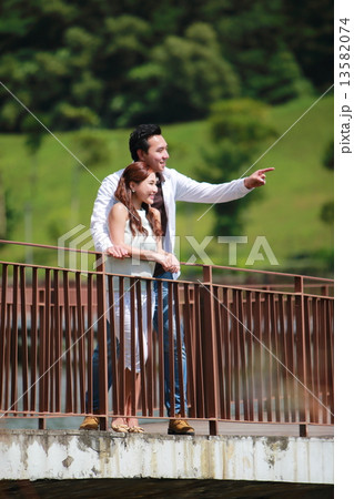 park, bridge, couple, dating, happy, leisure, strolling, relaxation, enjoys, fresh air, outdoor park, bridge, couple, dating, happy, leisure, strolling, relaxation, enjoys, fresh air, outdoor 13582074
