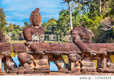 Angkor statues on the bridge, Cambodia 13584324