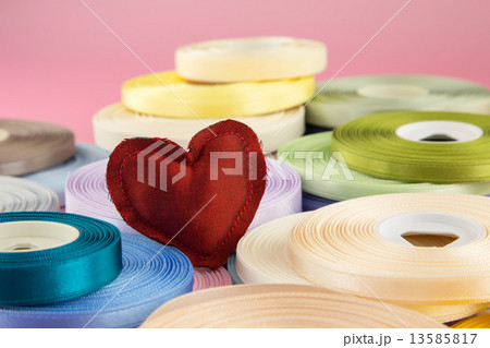 Red handmade love valentine heart  on ribbon rolls 13585817