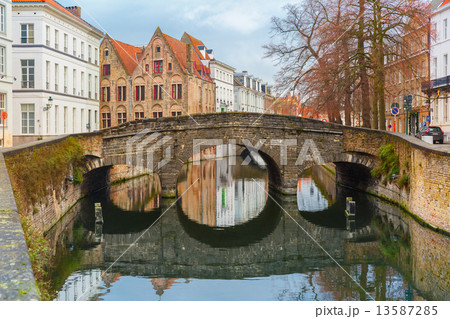 Scenic city view of Bruges canal and bridge 13587285