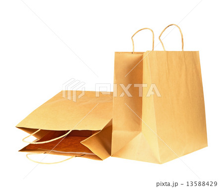 Empty brown recycled paper shopping bags isolated on white backg Empty brown recycled paper shopping bags isolated on white backg 13588429