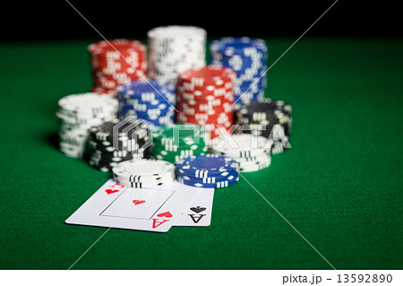 close up of casino chips and playing cards 13592890