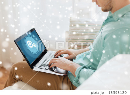 close up of man working with laptop at home 13593120