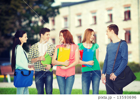 group of smiling students standing 13593696
