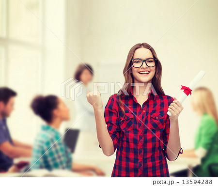smiling female student in eyeglasses with diploma smiling female student in eyeglasses with diploma 13594288
