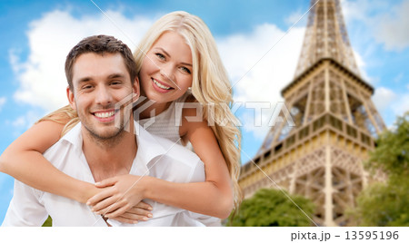 happy couple having fun over eiffel tower happy couple having fun over eiffel tower 13595196