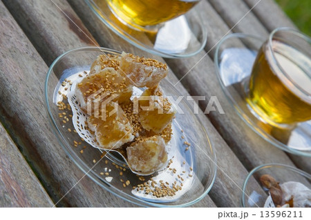 Light dessert -turkish delight with sesame seeds on the plate 13596211