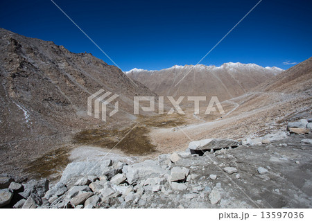 Winding road in mountains view 13597036