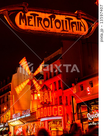 PARIS - DECEMBER 10: The Moulin Rouge by night, on December 10, 13597407