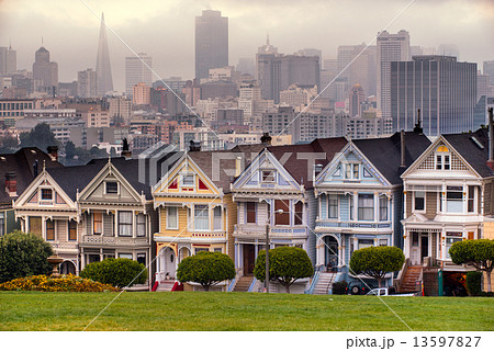 The Painted Ladies of San Francisco, California sit glowing amid 13597827