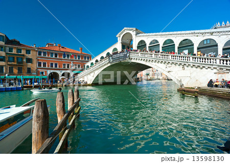Venice, italy - March 06, 2011: Peoples watching the Grand Canal 13598130