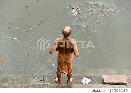 A Men washing on the ganges, Varanasi (Benares) 13598189