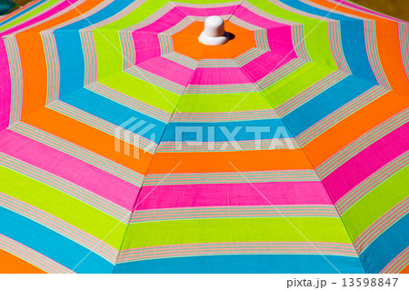 Colorful umbrella on the beach 13598847