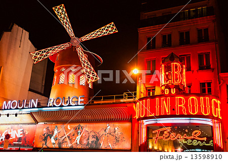 PARIS - DECEMBER 10: The Moulin Rouge by night, on December 10, 13598910